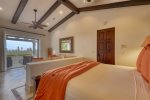 Bedroom 3 with two beds, en suite bathroom & a private terrace with amazing golf and ocean views